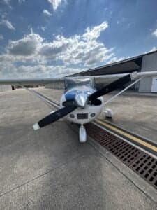 Front view of the Cessna 172 Skyhawk, registration N759CB, showing the propeller and nose.