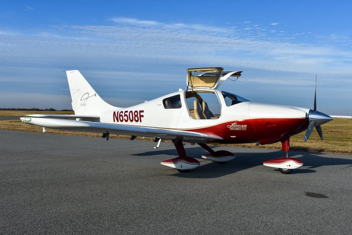 Rear quarter view of the Lancair Columbia 350 aircraft on the ground.