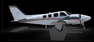 Front view of a Beechcraft Baron on a black background.