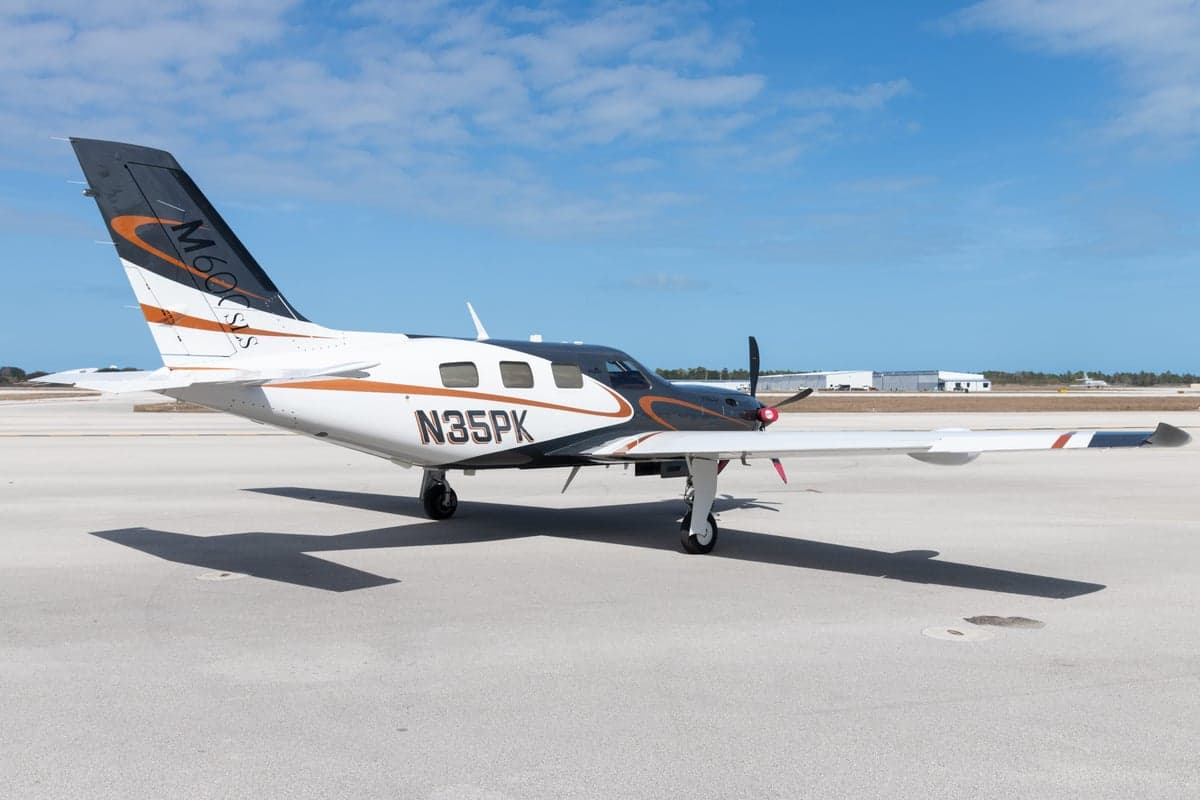 A Piper M600 HALO, registration N35PK, is parked on the tarmac.