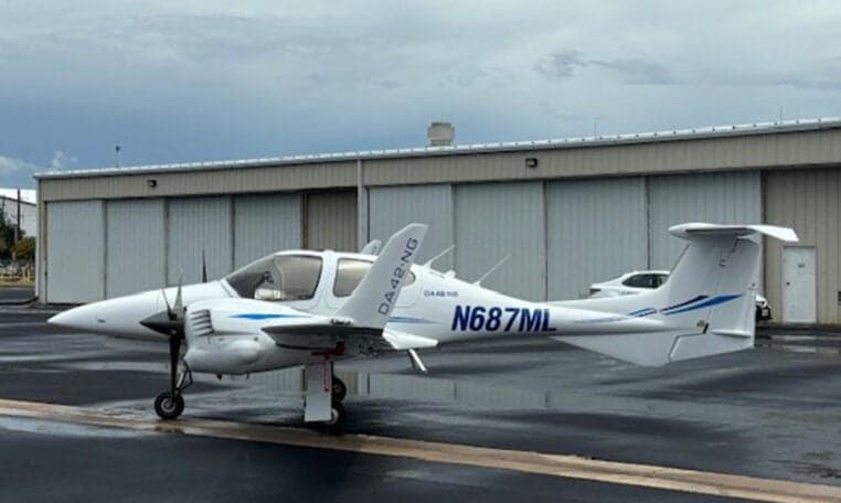 Diamond DA42-NG aircraft N687ML parked on the tarmac.