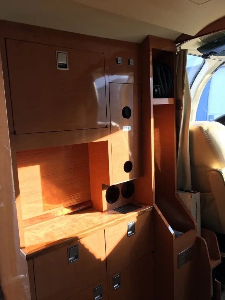 Interior cabinetry and storage in the aircraft cabin.