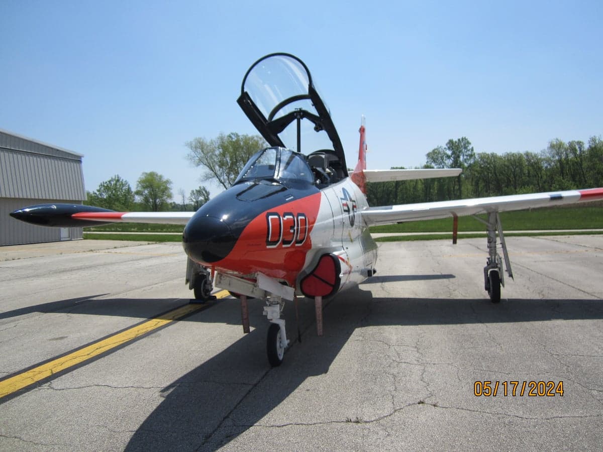 Front view of the T-2B Buckeye aircraft with the canopy open.