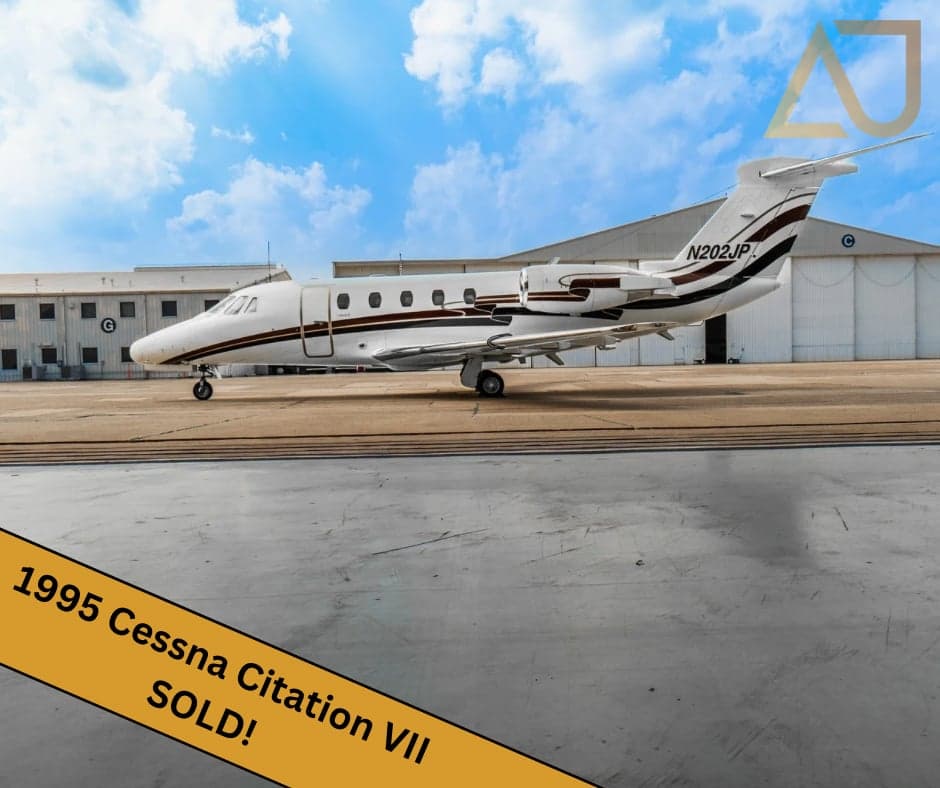 A 1981 Falcon 50 on the tarmac, with a 'SOLD!' banner.
