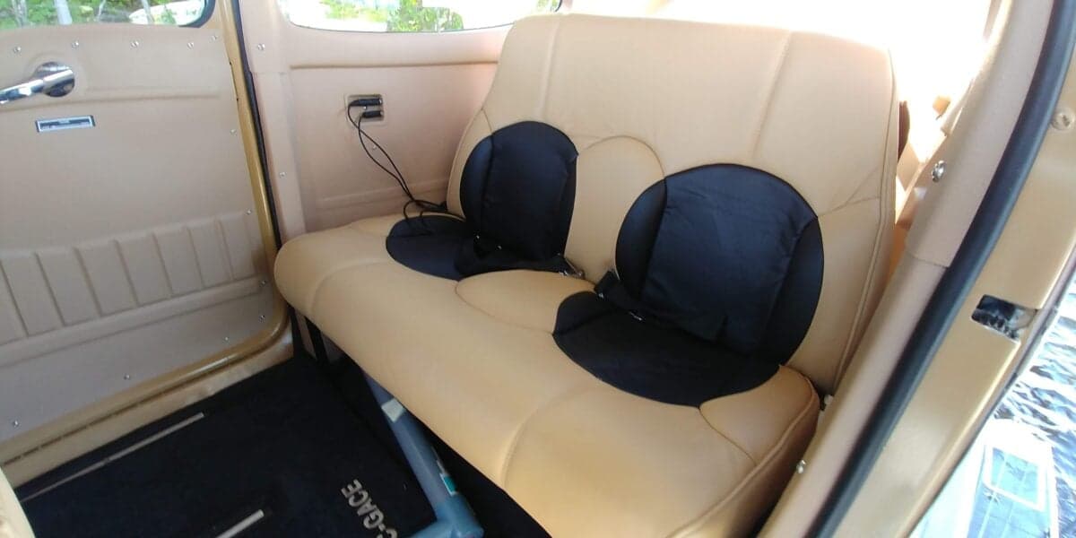 View of the rear seats of the aircraft interior.