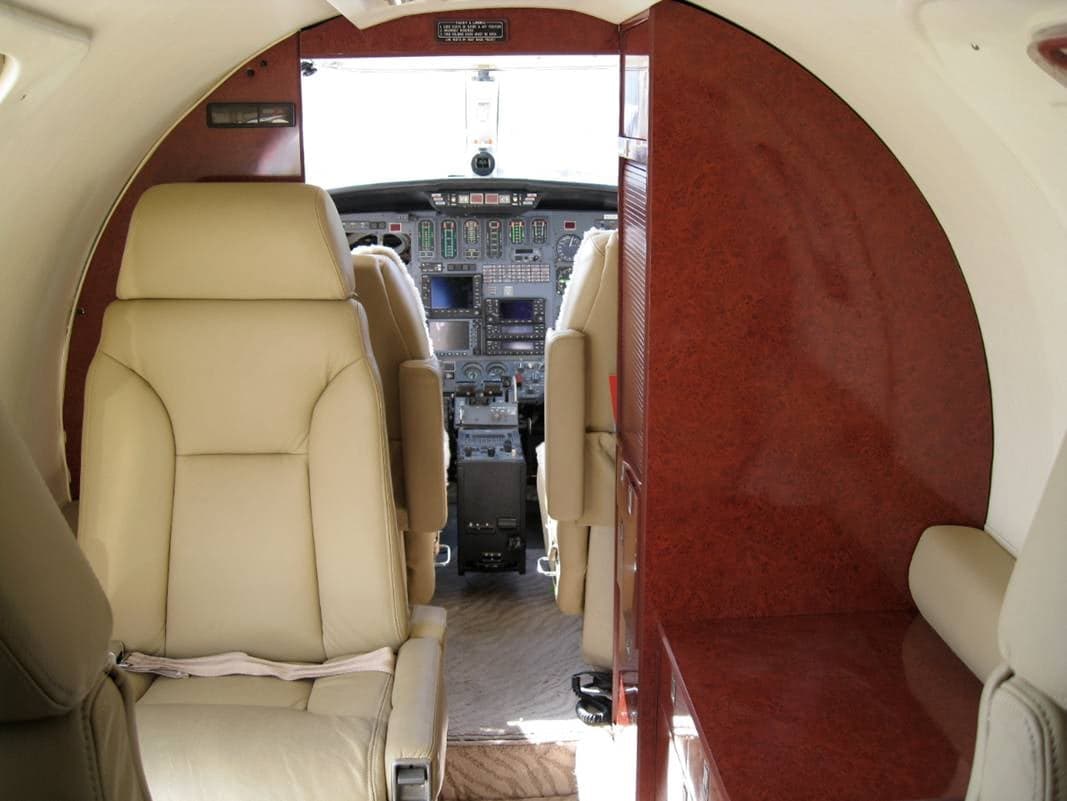 View of the Cessna Citation CJ1 cockpit from the cabin.
