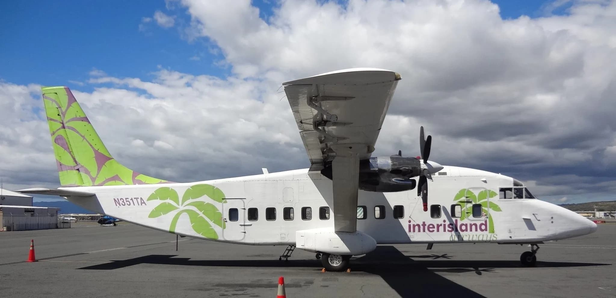 An Interisland Airways aircraft parked on the tarmac.