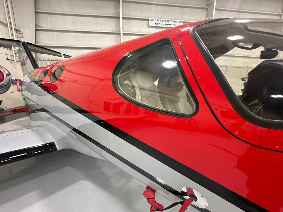 View of the aircraft's cockpit and side windows.