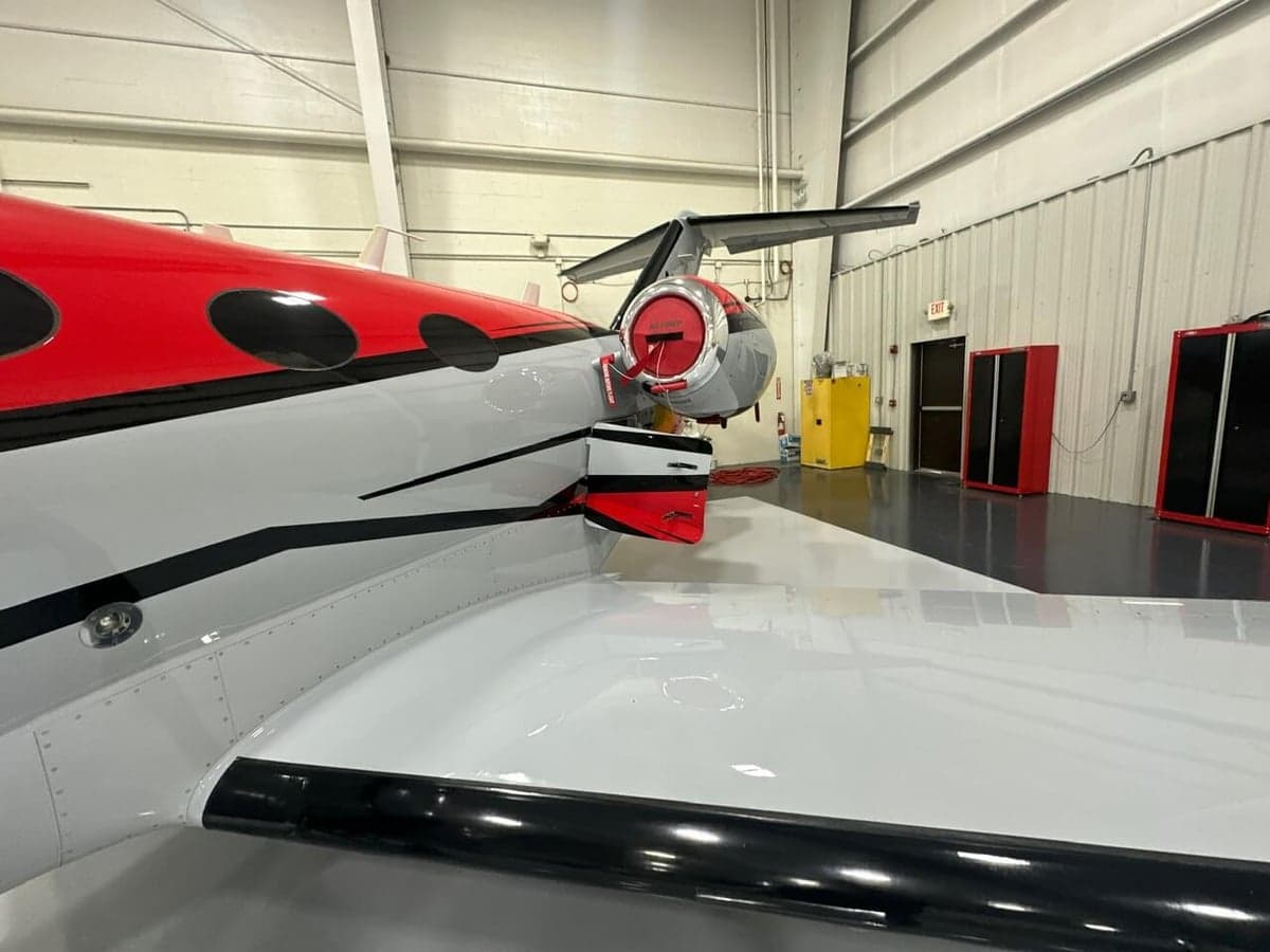 View of the aircraft's tail section and wing.