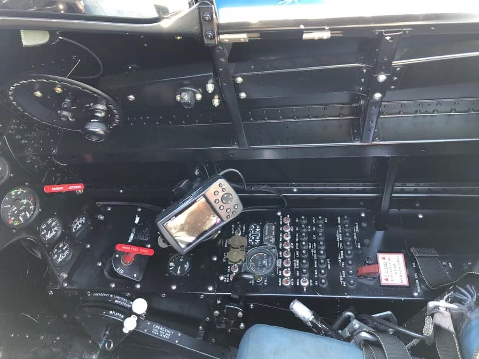 The instrument panel of an aircraft, showing various gauges and controls.