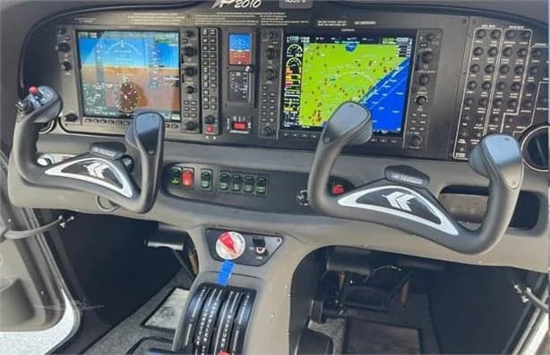 Avionics and control yokes in the cockpit of the aircraft.