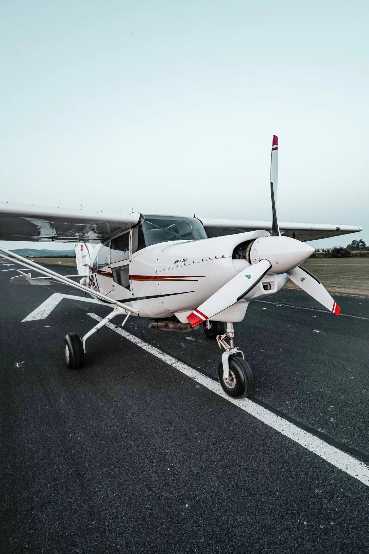 Front view of the D-EMBJ Maule STOL aircraft on the tarmac.