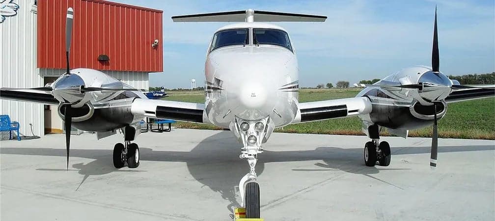 Front view of a Beechcraft King Air B200 on the tarmac.