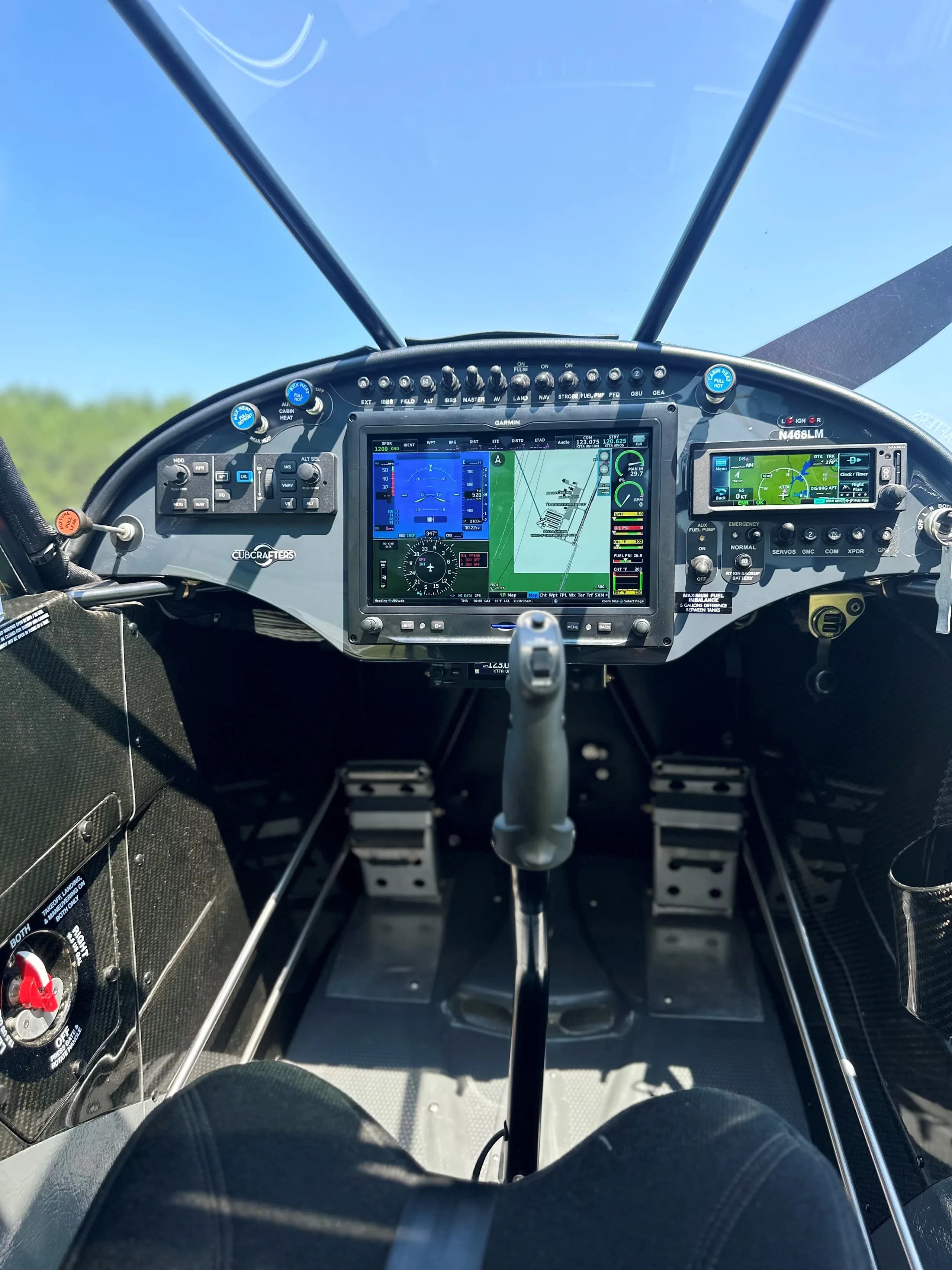View of the cockpit and instrument panel of the Carbon Cub FX-3.