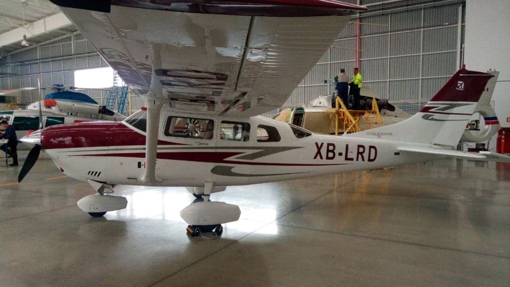 Side view of the Cessna XB-LRD in a hangar, showing the tail number.