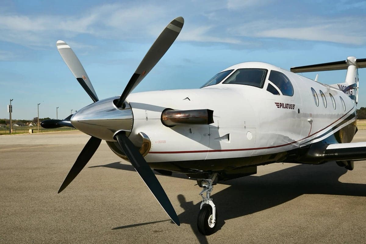 Close up of the front of a Pilatus PC-12NG on the tarmac.
