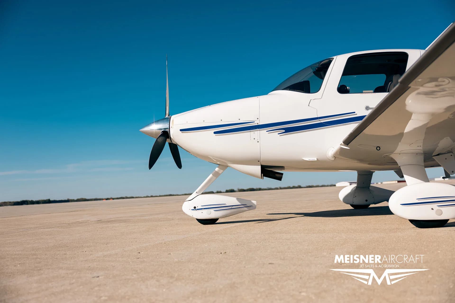 Close-up of the front of Cirrus SR22 aircraft, registration N722PB.