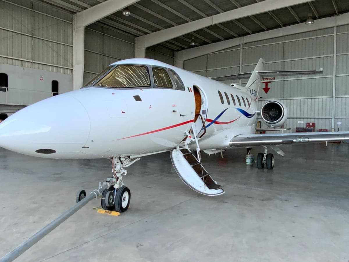 Close up of the front of XA-DAR Falcon 50 with the door open.