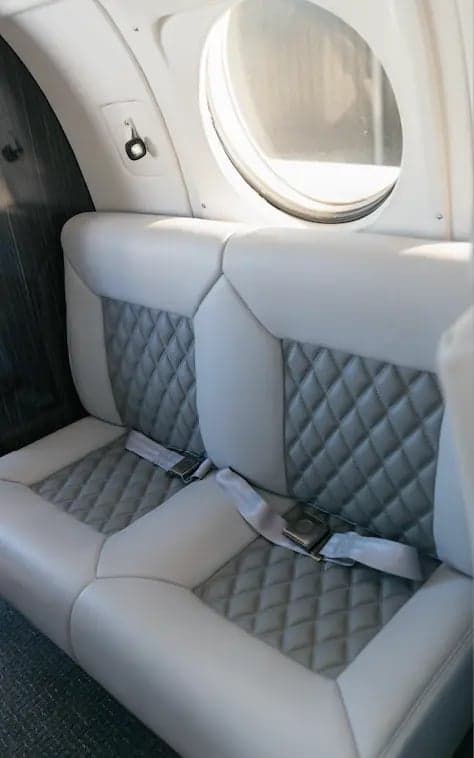 Two seats inside the King Air B200 aircraft.