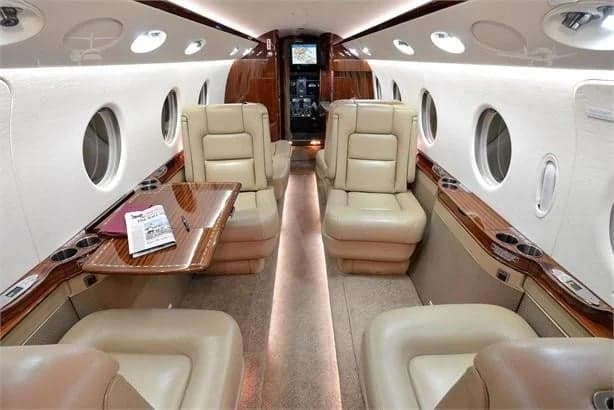 A view of the aircraft's interior, showcasing the seating arrangement and cabin design.