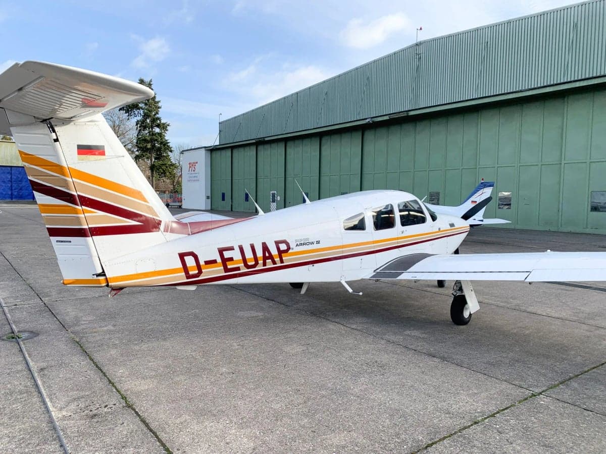 Rear view of the D-EUAP Piper Arrow II showing tail markings.