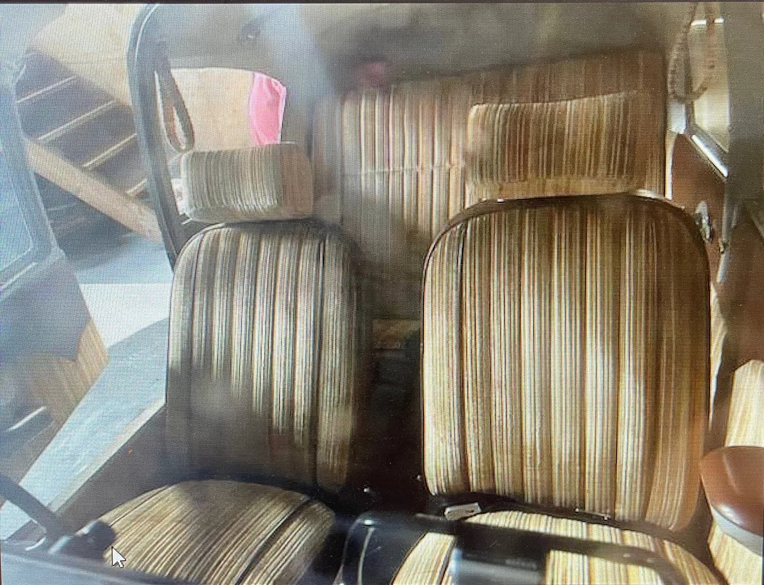 View of the aircraft's interior, showing the seats and cabin area.