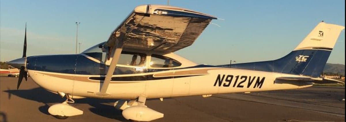 A Cessna 182 Skylane with registration number N912VM on the tail.
