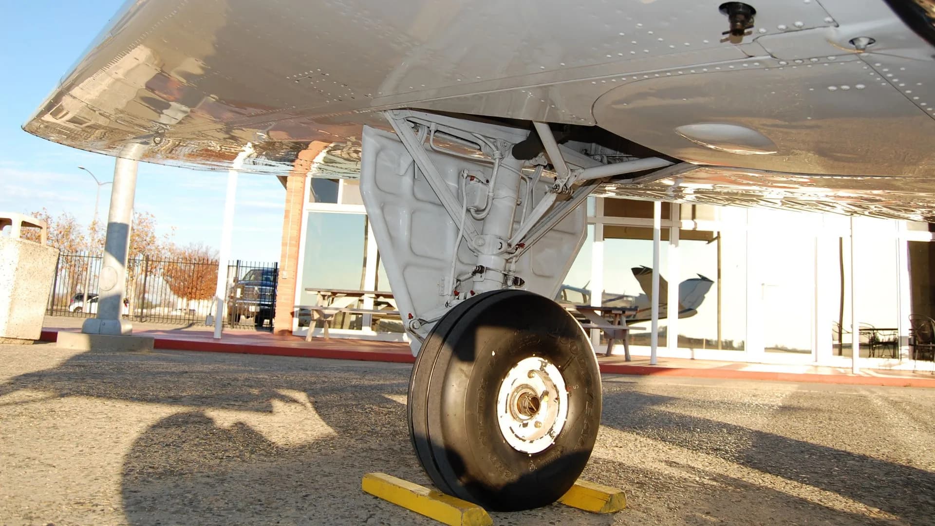 Close-up of the aircraft's landing gear and wheel.