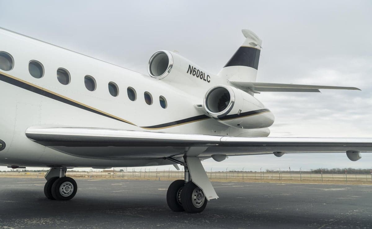 Close up of the tail section and engines of the Falcon N608LC.