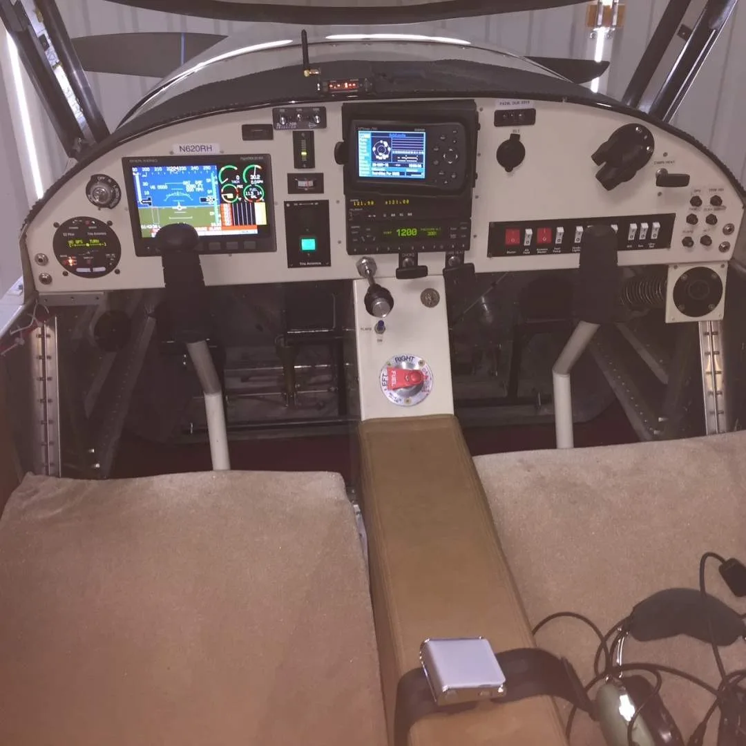 The cockpit of the Zodiac CH601 XL B, showing the instrument panel with multiple screens and controls.