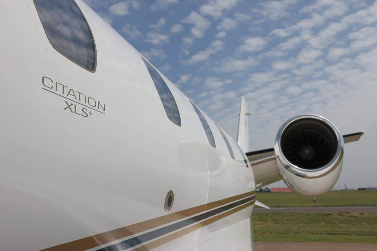 Close-up of the Citation XLS+ fuselage and engine.