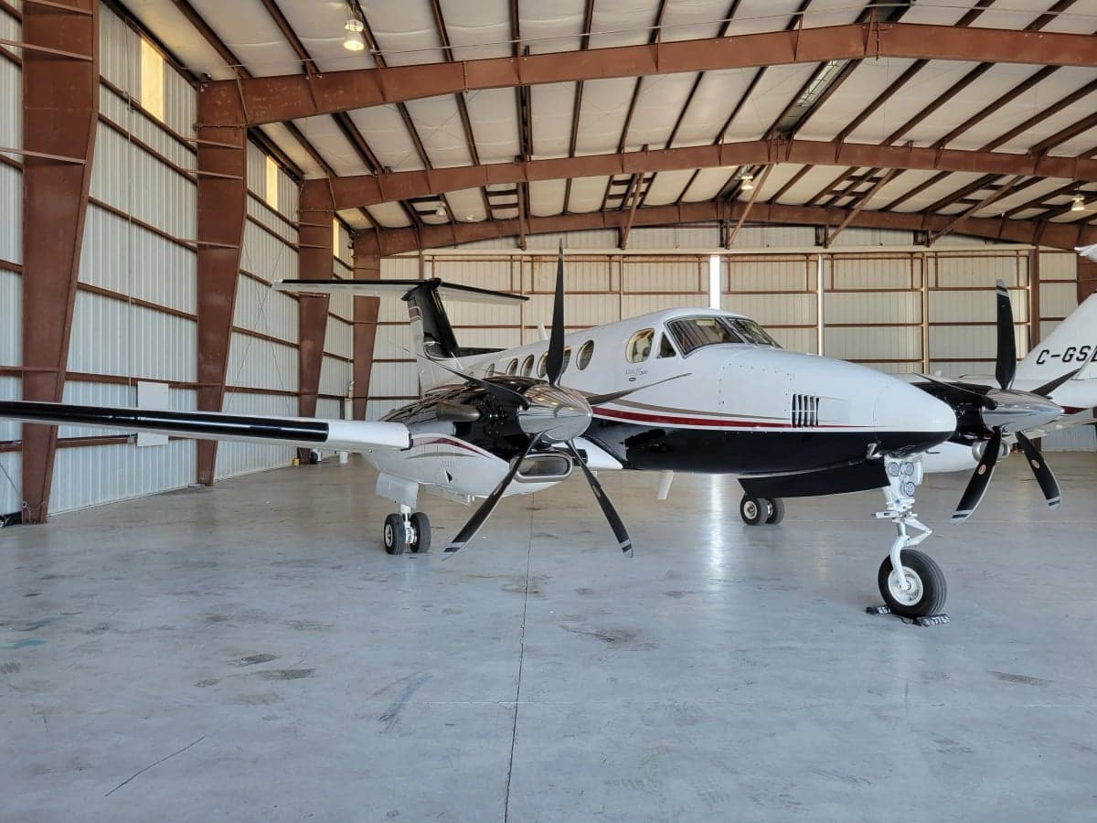 N494MA King Air in a hangar, wide shot.