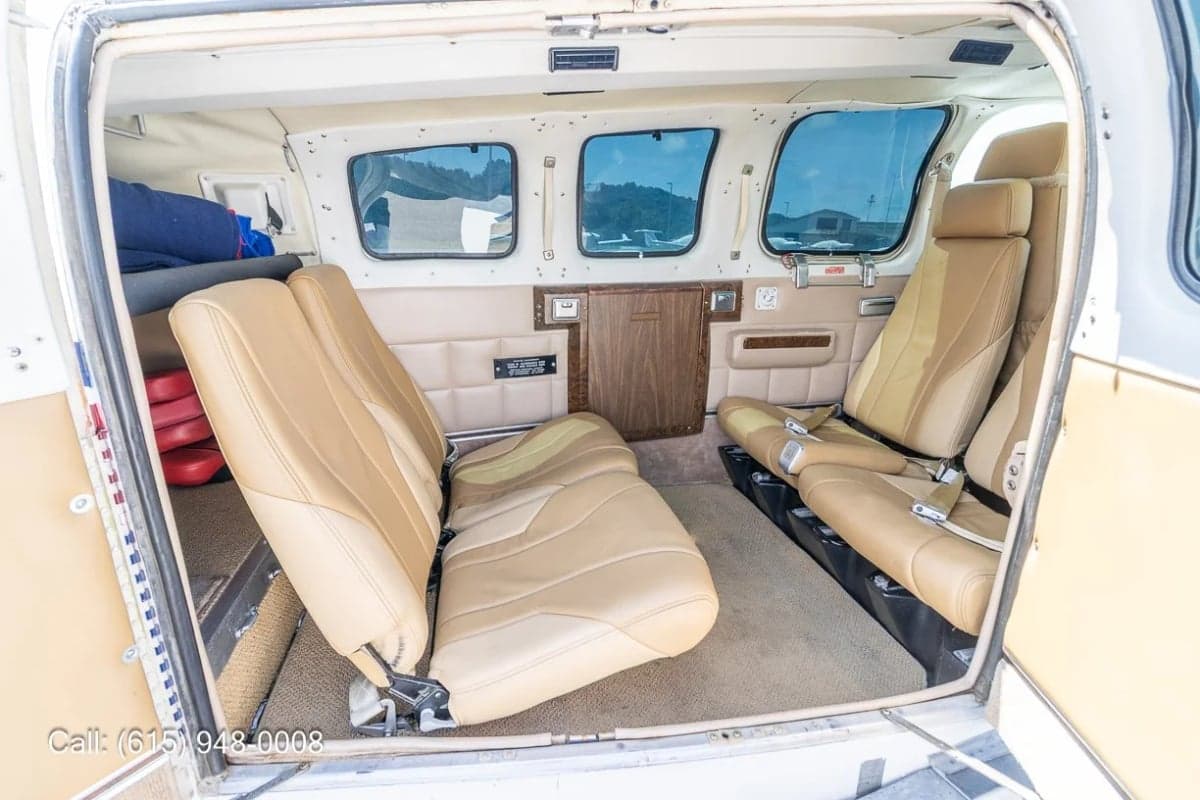 View of the interior of a Beechcraft Baron with the door open.
