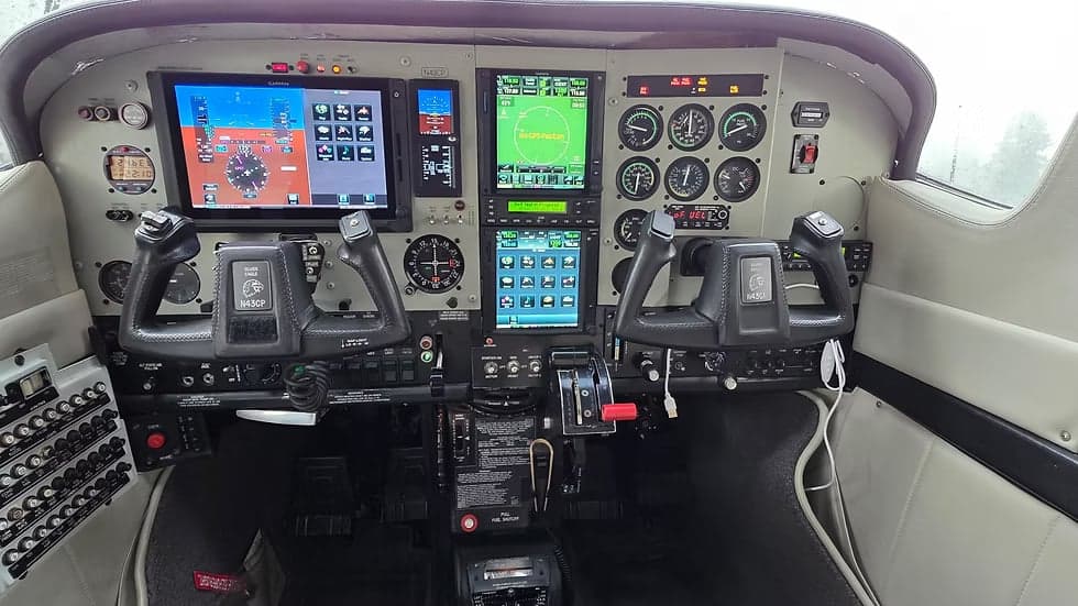 Detailed view of the aircraft's cockpit with modern avionics.