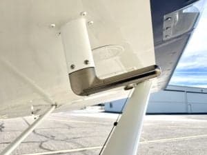 Close up of the cowling of a blue Carbon Cub FX3 aircraft.