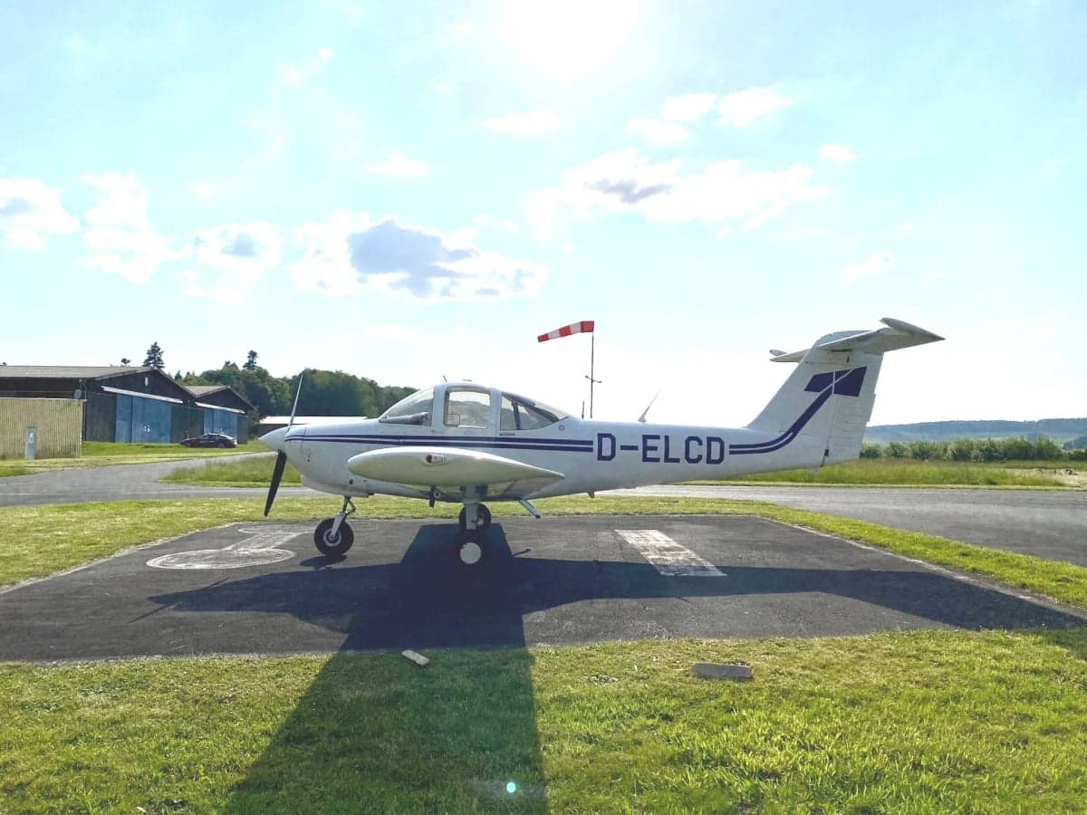 D-ELCD aircraft parked on the tarmac.