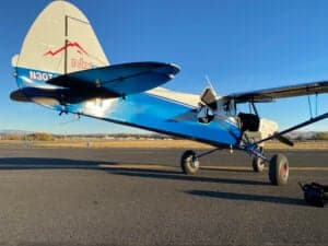 The tail of a Cubcrafters aircraft with the registration number N30TA.