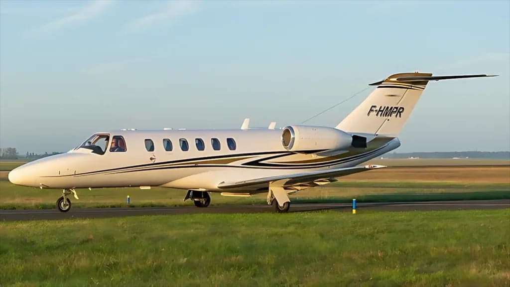 A Cessna Citation CJ2 aircraft with registration F-HMPR on the ground.