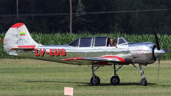 LY-EUG aircraft in flight from a low angle.