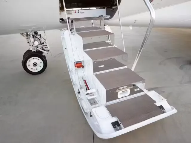 The airstair door and landing gear of a Bombardier Global Express business jet.