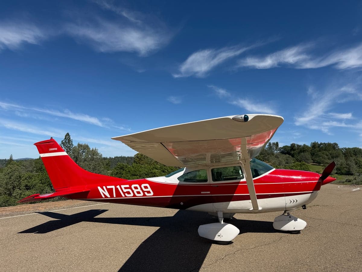 View of the aircraft's headliner and seatbelt.