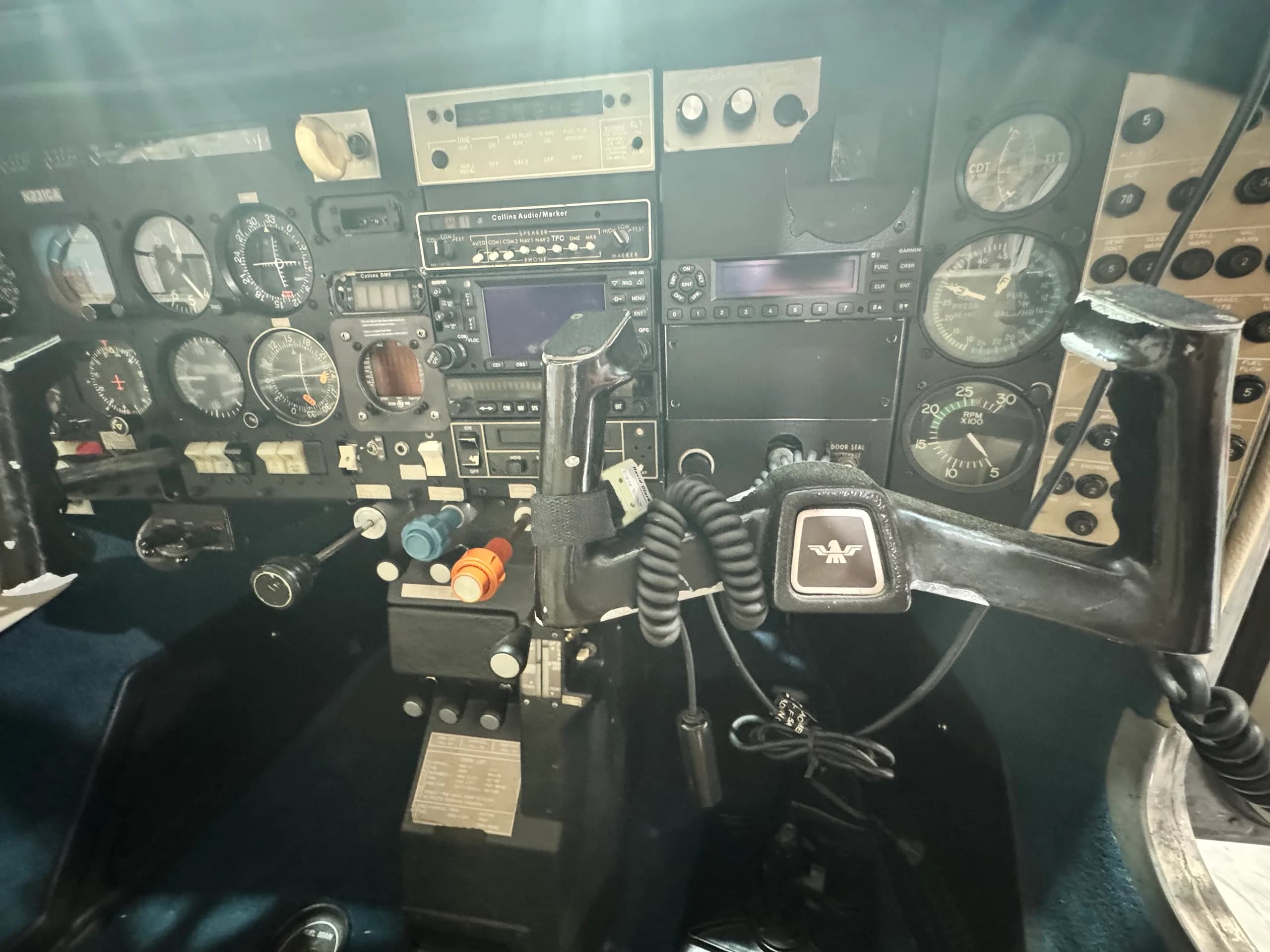 Close-up view of the aircraft's instrument panel, yokes, and various controls.
