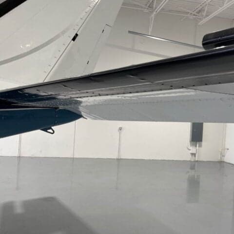 Close-up of the wing of a Piper PA-31 Navajo.