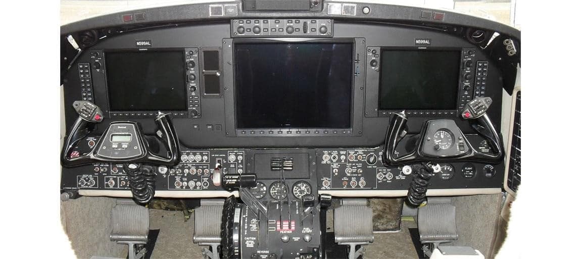 Detailed view of the Beechcraft King Air cockpit instrument panel.
