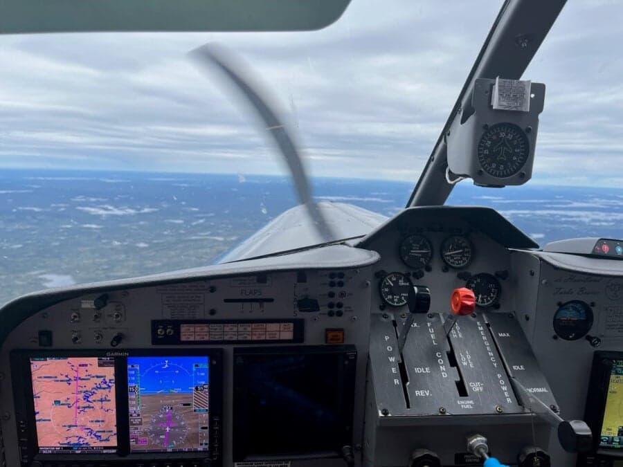 View of the cockpit instruments and controls during flight.