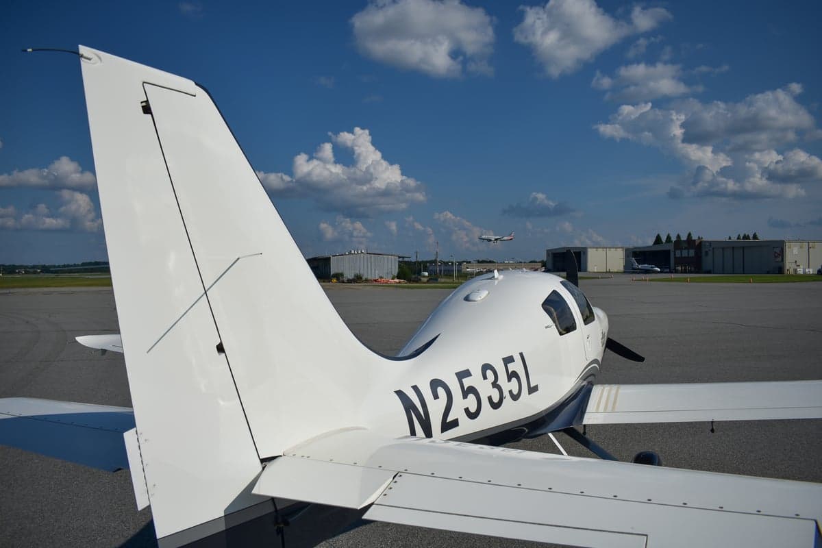 Close-up of the tail number N2535L on the Lancair Columbia 400 aircraft.