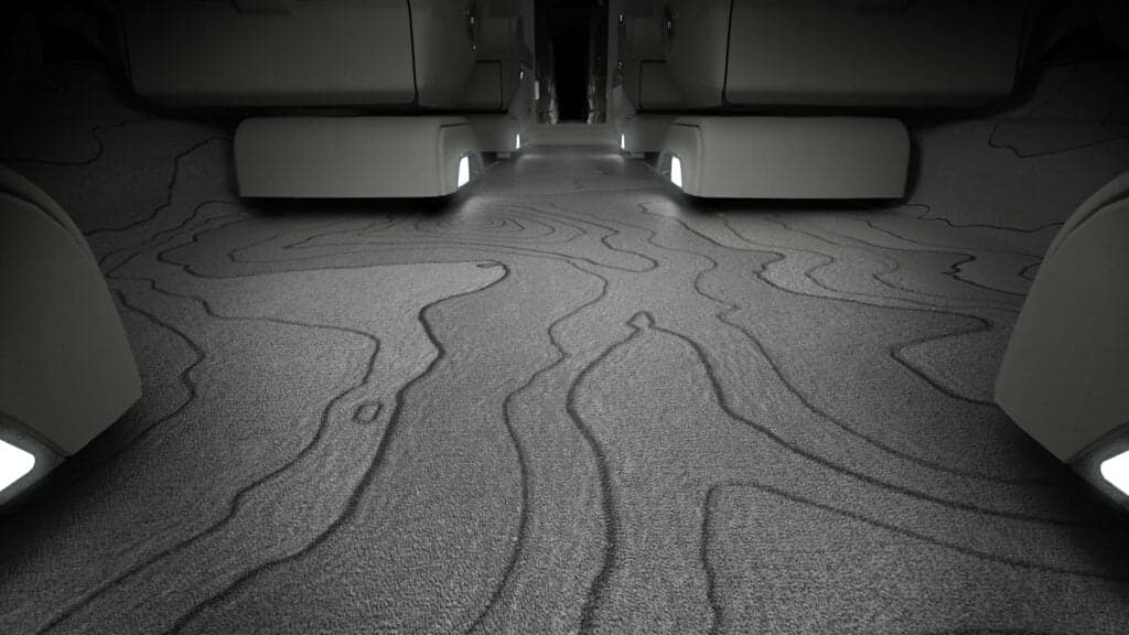 View of the aircraft's carpet with a topographic design.