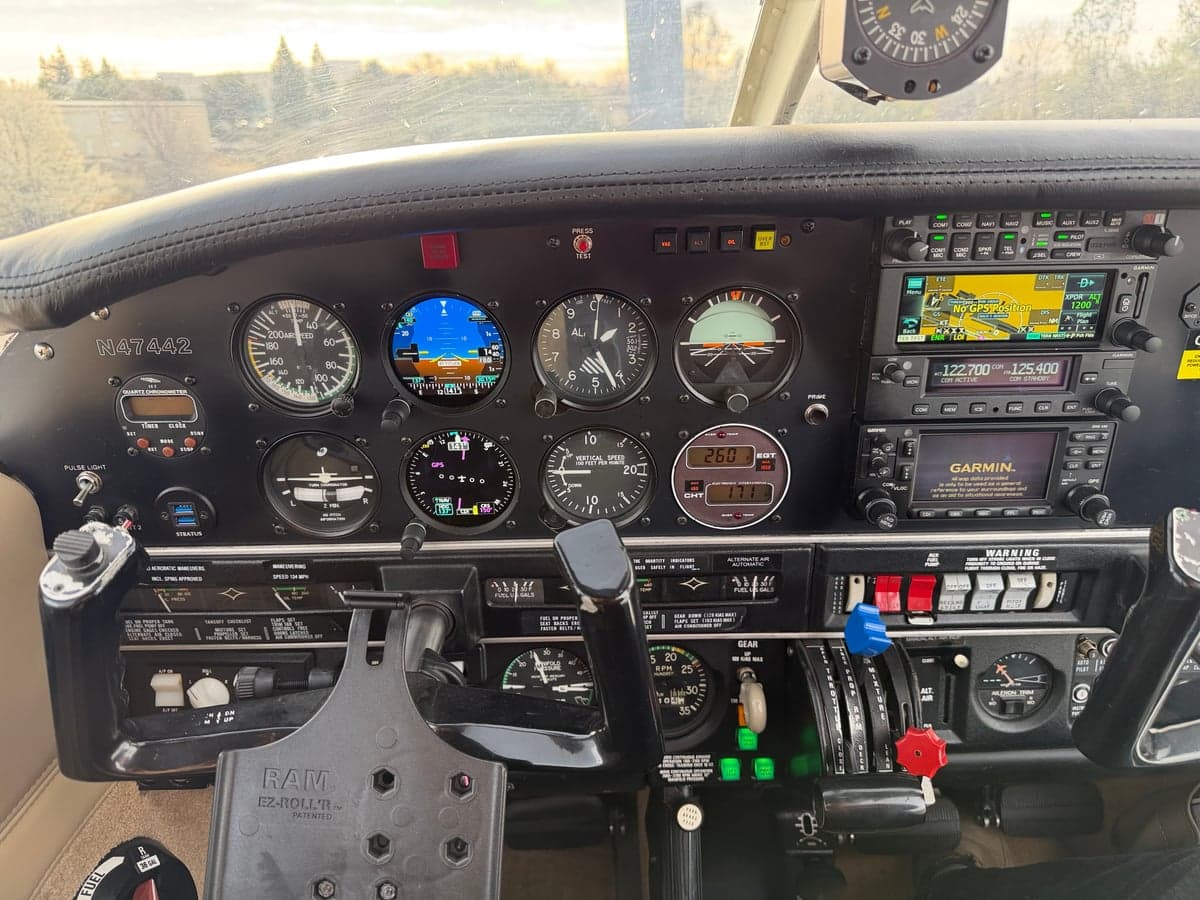 Full view of the instrument panel and controls in the cockpit.