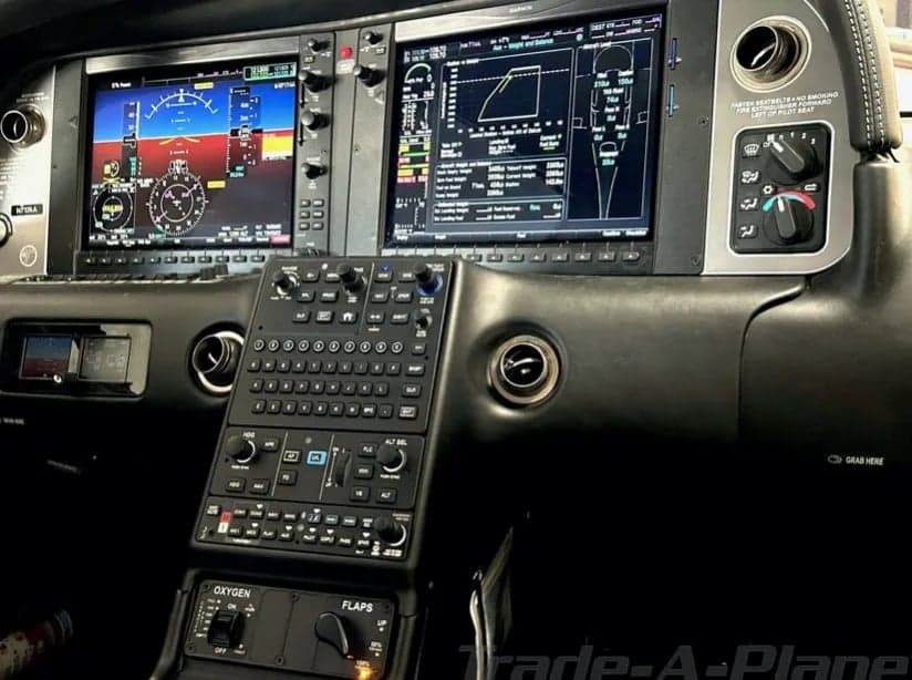 Close-up of the aircraft's instrument panel with Garmin avionics.