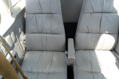 Close-up of the aircraft's gray leather seats.
